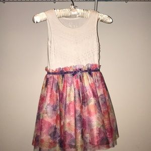 New white lace dress and floral pattern.